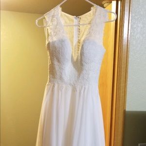 Lis Simon Designer Wedding Gown. Size 2